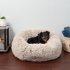 image:imageFurhaven 23 Round Calming Donut Dog Bed for Indoor Cats amp Small Dogs Washable For Dogs Up to 20 lbs  Shaggy Plush Long Faux Fur Donut Bed  Gray Small 230L x 230W x 90ThTaupe